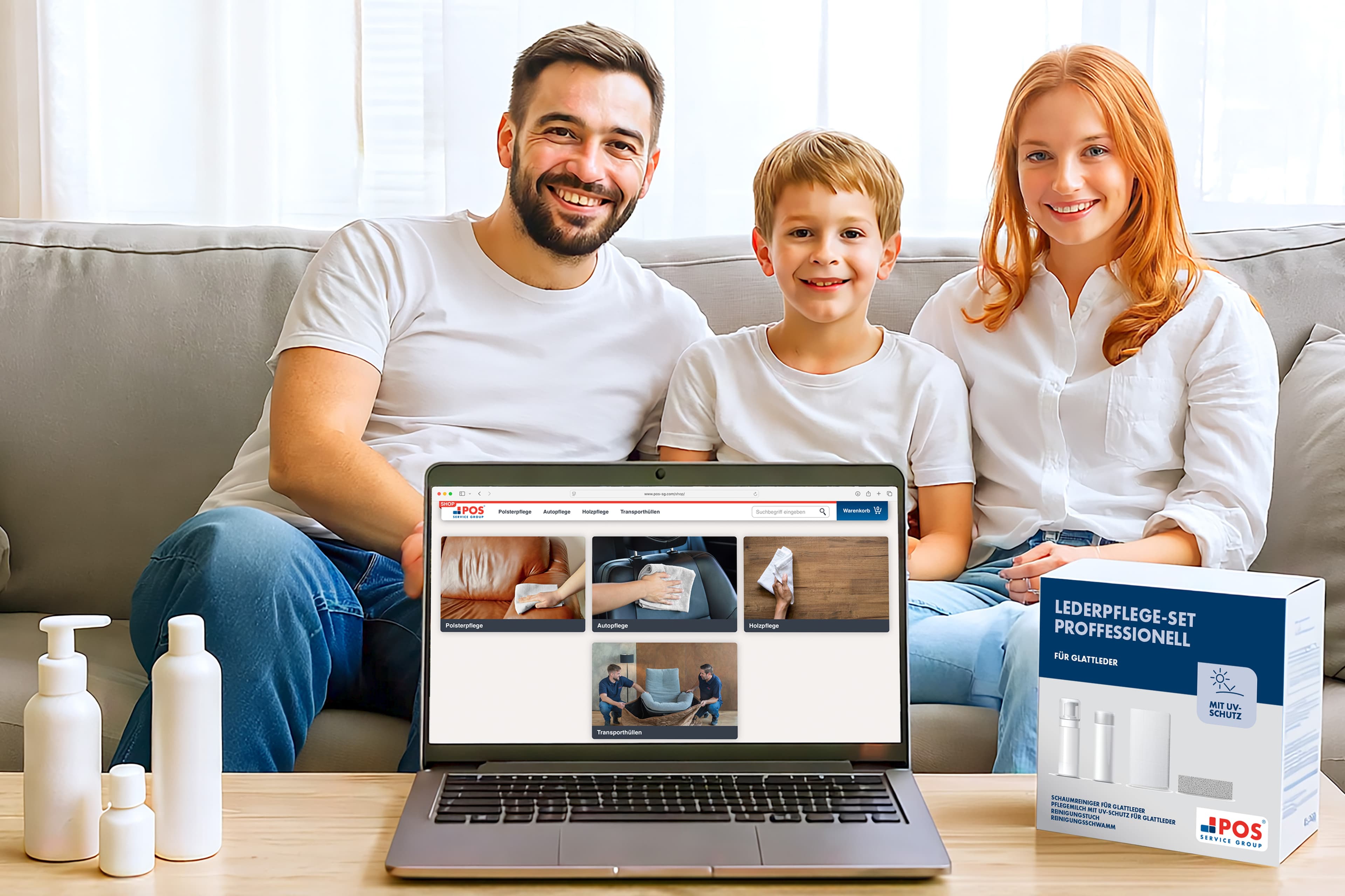 A smiling family of three sits on a couch behind a laptop displaying a cleaning website. Bottles are on the table, and a leather care kit box is placed beside the laptop.